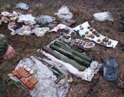 На Луганщині СБУ виявила схрон із військовими засобами ураження