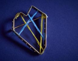  Новою відзнакою від Глави держави «Золоте серце» нагороджені двоє волонтерів з Луганщини